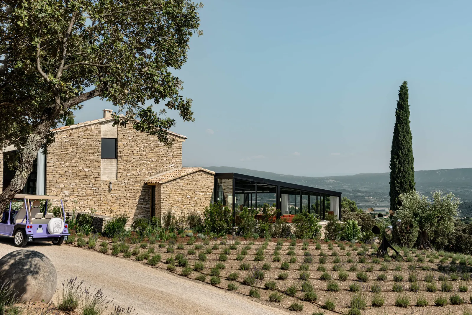 Les Hauts de Gordes bastide above the Luberon, with lavender rows and the valley beyond